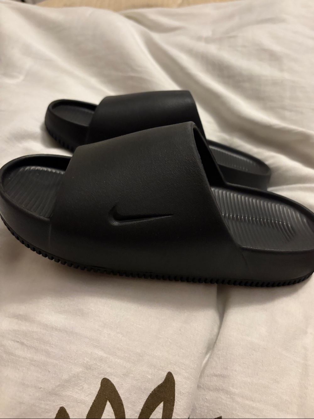 Nike Black Men's Slide Sandals with Embossed Swoosh